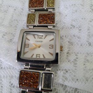 George wrist watch dressy style silver tone with topaz green sparkle band Tested